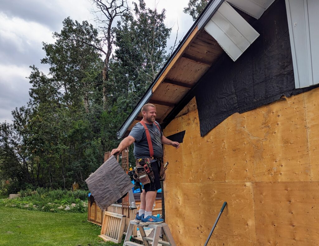 removing old paper from exterior of home